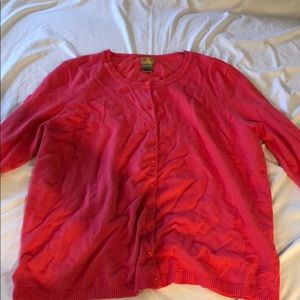Bright pink cardigan sweater